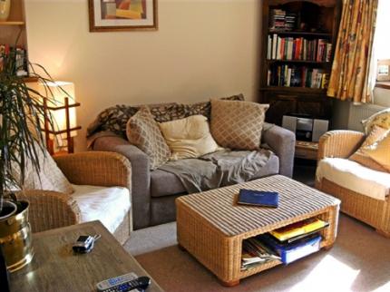 PThe living room of lothlorien holiday home io Wales